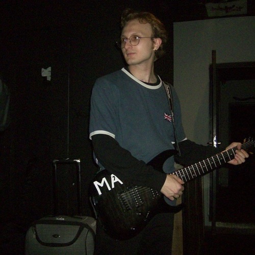 Photo of Ibanez GRG7221QA in a guitar