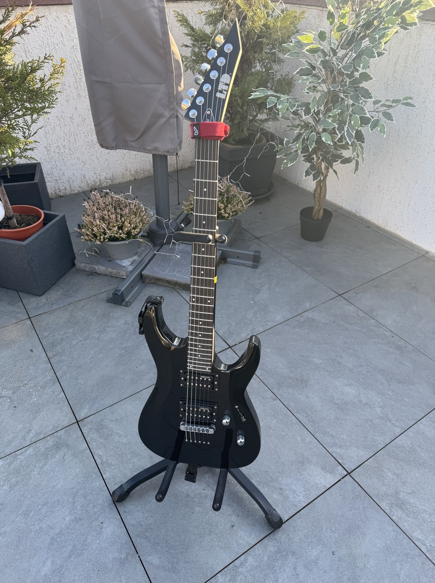 Metal Music Gear Setup by kamiguitar featuring LTD MH-10, Ernie Ball Regular Slinky Guitar Strings (10-46), and Gruv Gear FretWrap and 2 more pieces of gear