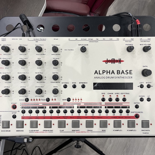 Photo of Jomox Alpha Base in a studio and drums