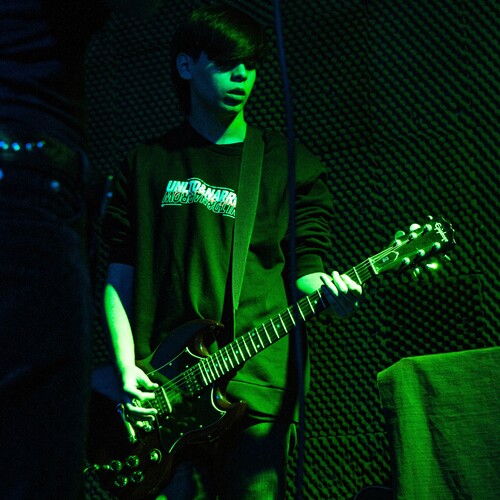 Photo of Epiphone SG G-310 in a guitar