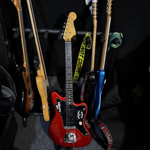 Photo of Squier Deluxe Jazzmaster ST in a guitar