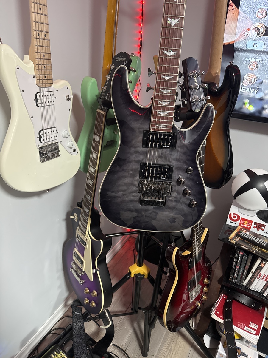 Metal Music Gear Setup by cai_tucker featuring Schecter Omen Extreme-FR, Epiphone Les Paul Classic, and Squier Mini Jazzmaster HH and 2 more pieces of gear
