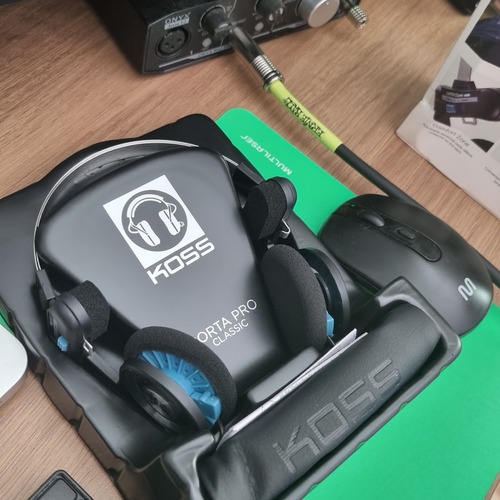Photo of KOSS Porta Pro and more gear in a studio and live