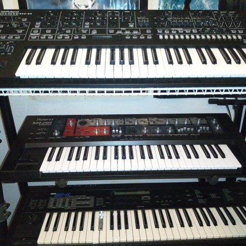 Photo of Korg DS-8 and more gear in a studio and synths