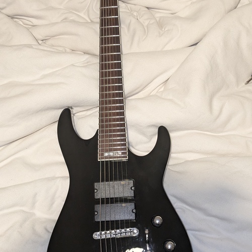 Photo of LTD SC-207 in a guitar