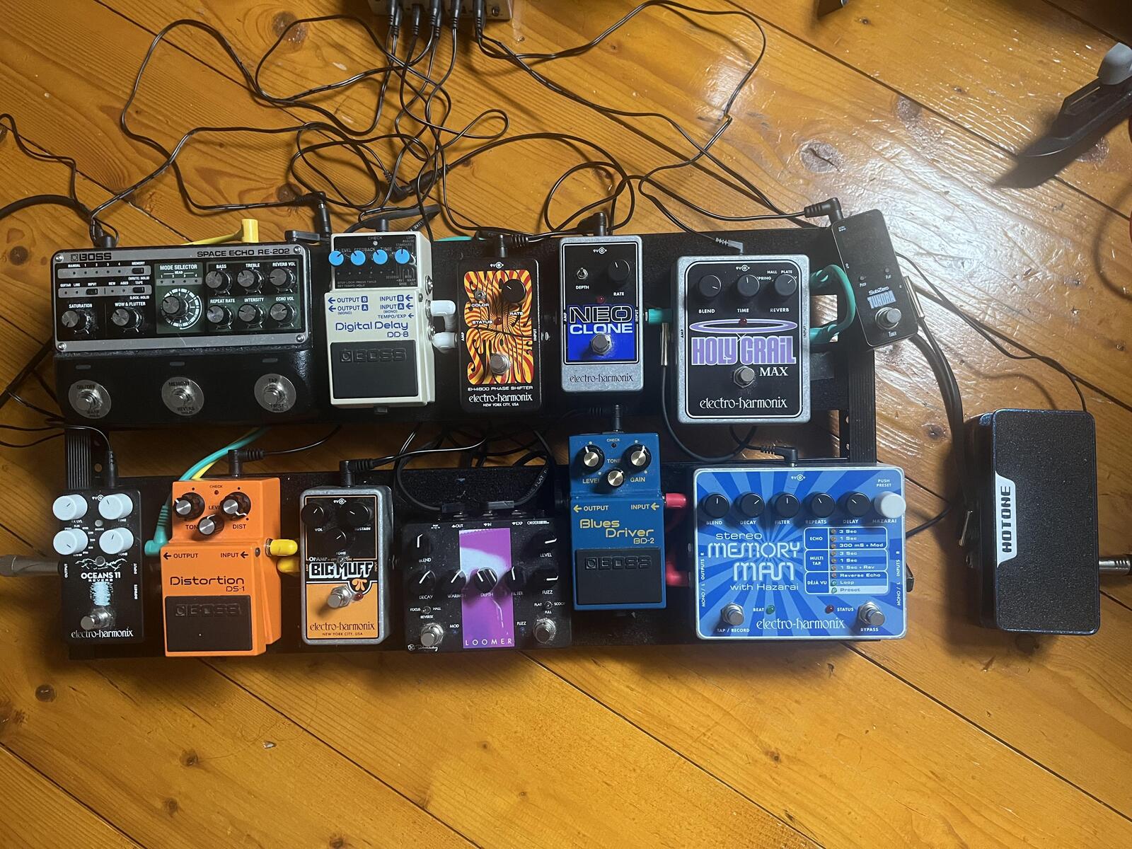 Electro-Harmonix Pedalboard by yewn featuring Boss RE-202 Space Echo, Electro-Harmonix Stereo Memory Man with Hazarai, and Boss BD-2 Blues Driver and 10 more pieces of gear