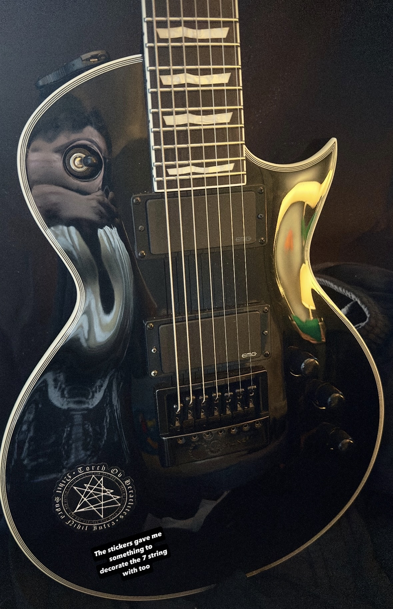 Music Gear Setup by martin_castro featuring ESP EC-1007 EVERTUNE, D'Addario 2-inch Nylon Auto Lock Guitar Strap - Padded Black, and Dunlop TVMN10637 Heavy Core Trivium Electric Guitar Strings - .010-.063, 7-string