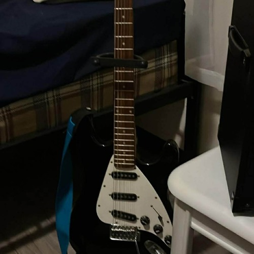 Photo of First Act ME301 in a guitar