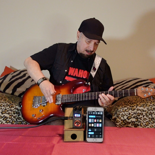Photo of Valeton GP-5 and more gear in a pedalboard and guitar