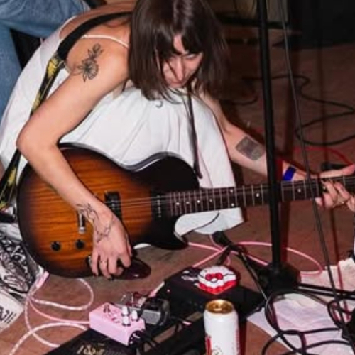 Photo of Electro-Harmonix Nano Muff Overdrive and more gear in a pedalboard and guitar