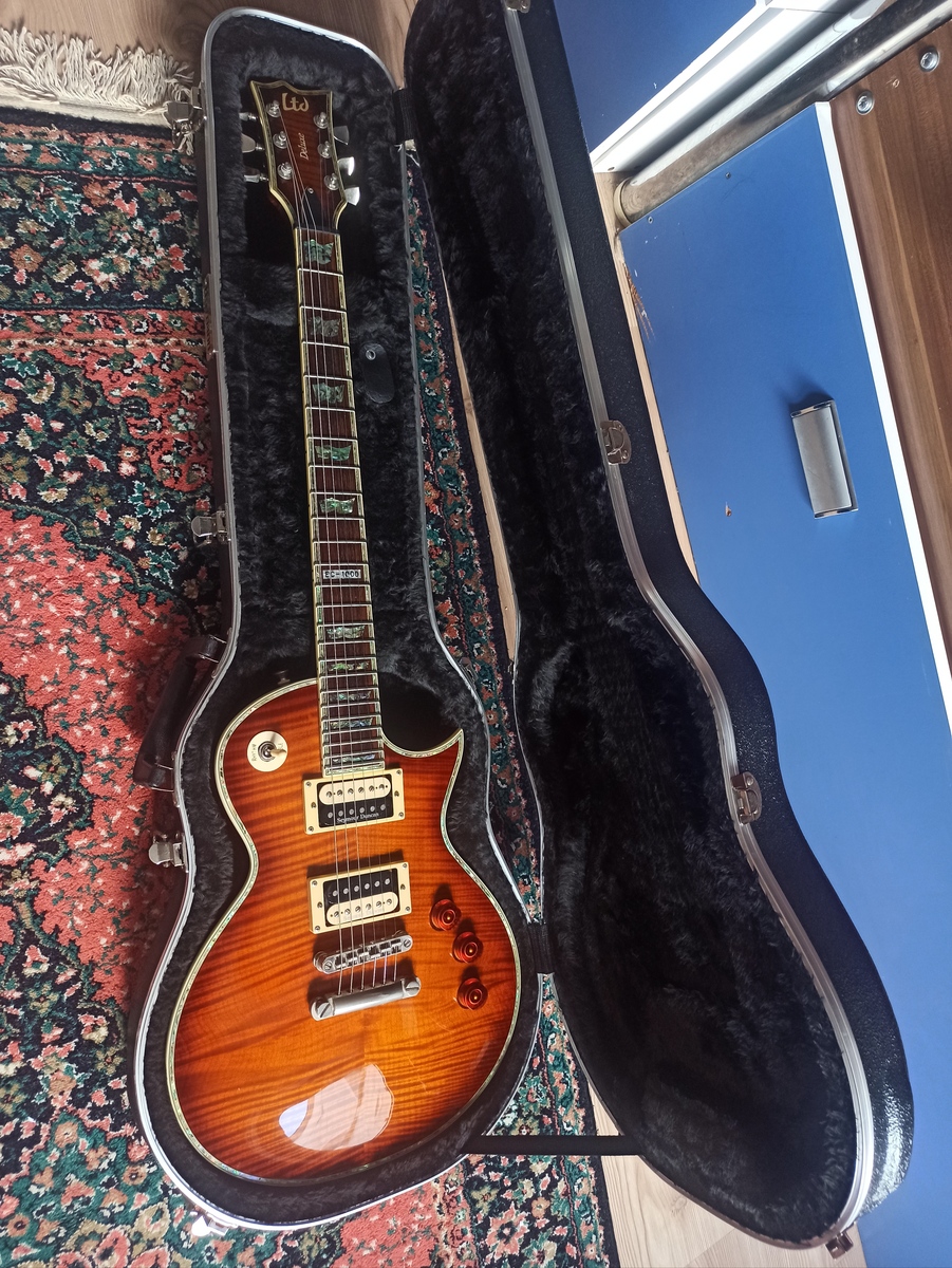 Thomann Music Gear Setup by hakanbaysal featuring LTD EC-1000 Flamed Maple Amber Sunburst and Thomann E-Guitar Case ABS Single Cut