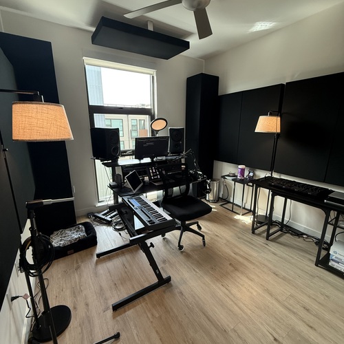 Photo of Omnirax Presto and more gear in a studio and DJ