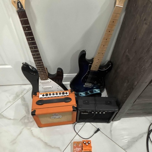 Photo of Glarry GA-20 and more gear in a pedalboard, pedal, guitar, and amplifier