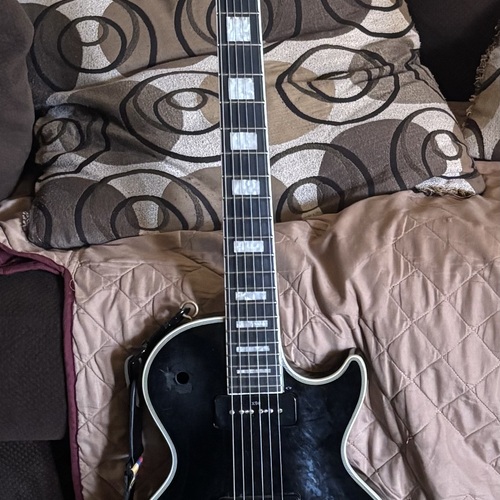 Photo of Epiphone Les Paul Custom 55 in a guitar