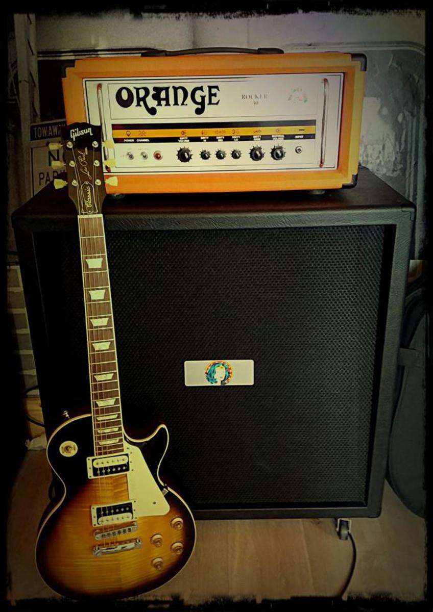 Music Gear Setup by nicolas_muzotte featuring Orange Rocker 30 (Head), NOS 4x12 (2 Celestion V30 & 2 Celestion Creamback 75), and Gibson Les Paul Classic Plus 60s