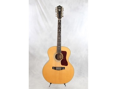 John denver deals 12 string guitar