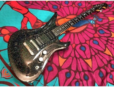 j yuenger guitar