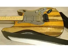 Warmoth Custom & Handmade Black Korina/3A Flame Maple CBS Stratocaster #2 is a newer version of Warmoth Custom & Handmade Korina/3A Flame Maple CBS Stratocaster