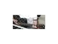 Black Taylor acoustic guitar