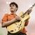 See how Ezra Koenig uses Taylor 214ce